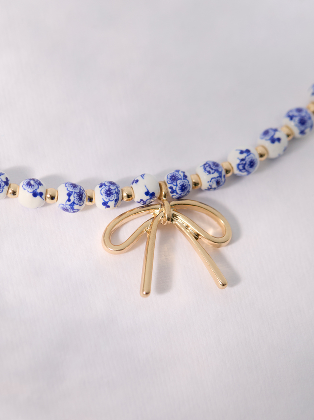 Painted Bead Bow Charm Necklace Detail 2 - ARULA
