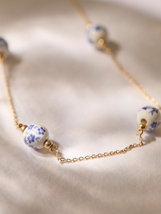 Painted Blue Bead Station Necklace Detail 2 - ARULA