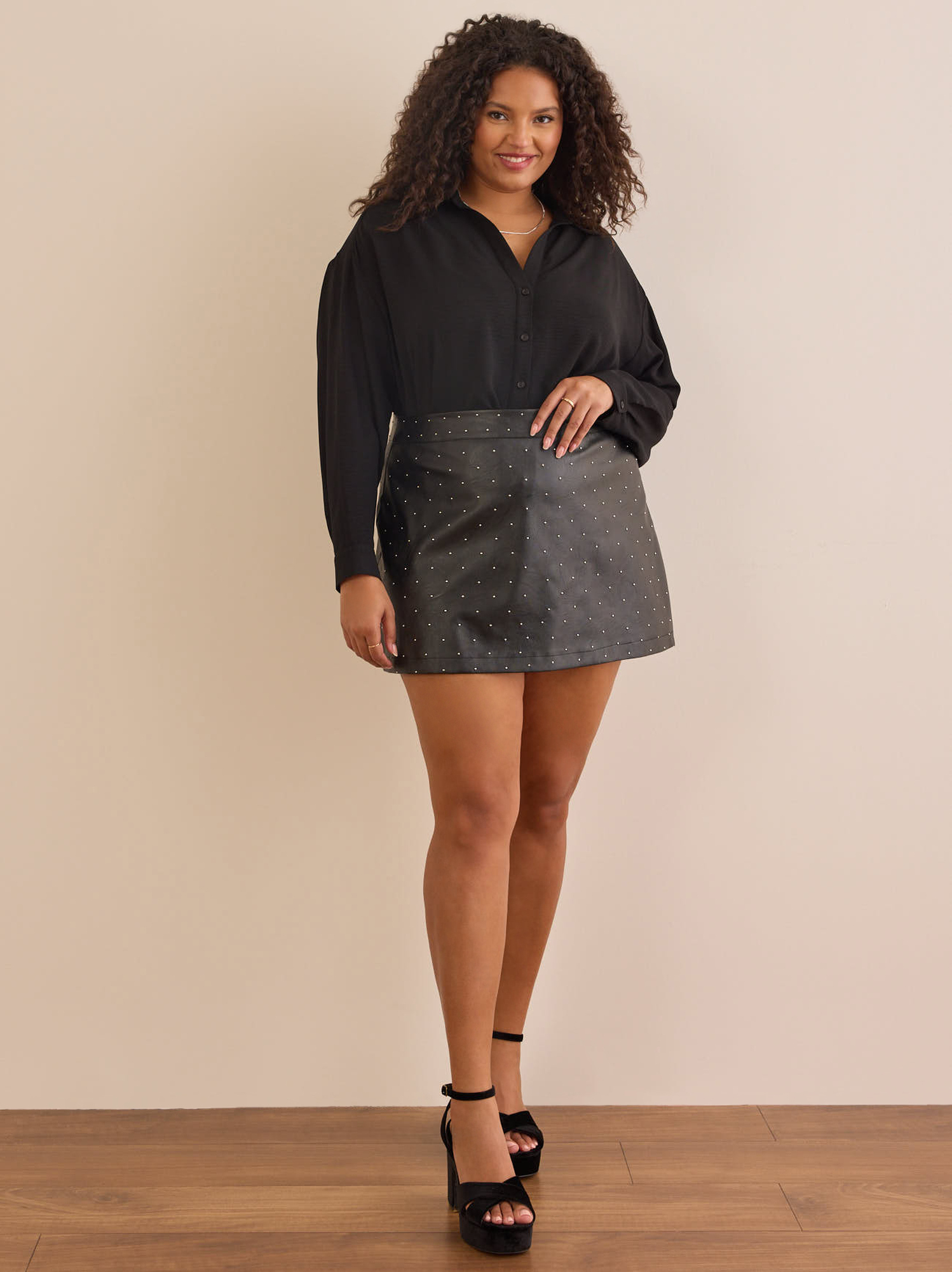 Ravenly Studded Mini Skirt in Black | Arula