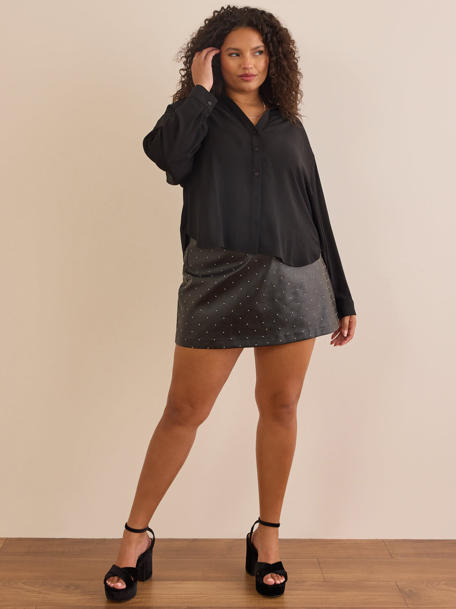 Ravenly Studded Mini Skirt in Black Arula